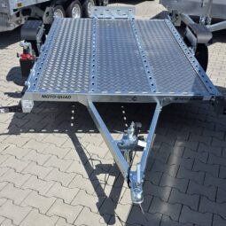 Motorcycle trailer with lowering mechanism