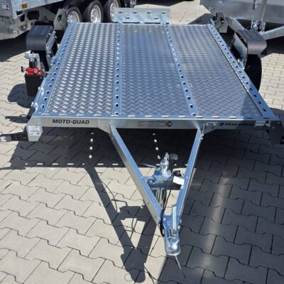 Motorcycle trailer with lowering mechanism